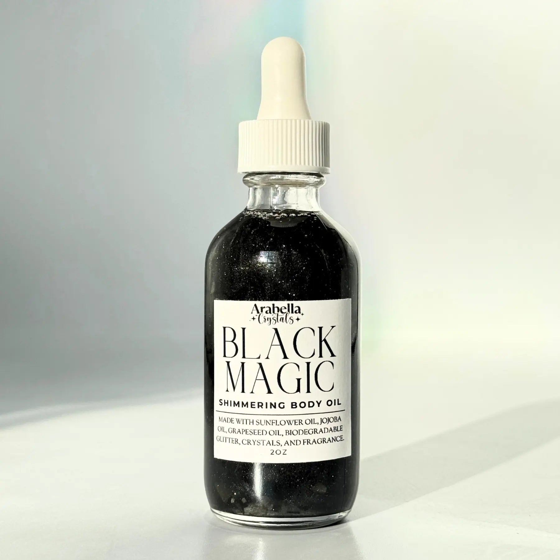 Black Magic Shimmer Oil Notes of: Incense, Dark Musk, Ylang Ylang