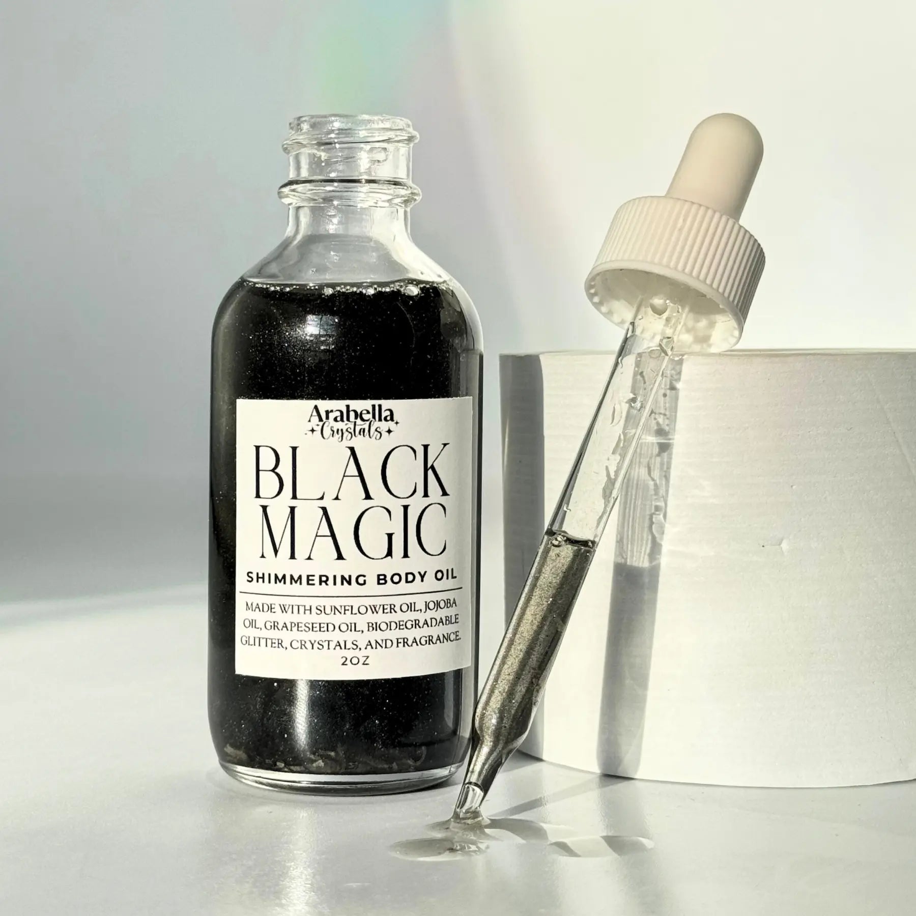 Black Magic Shimmer Oil Notes of: Incense, Dark Musk, Ylang Ylang