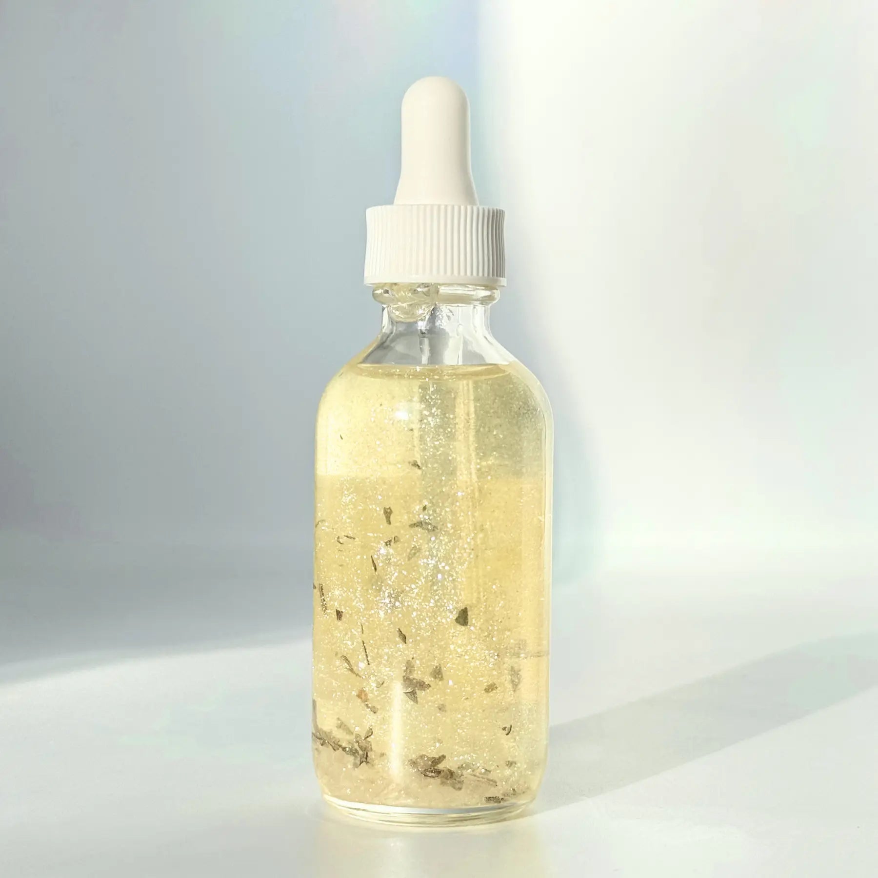 Divine Light Shimmer Oil Notes of: Lemon, Bergamot, White Tea