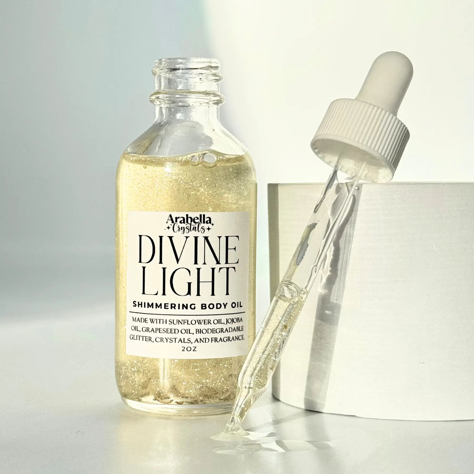 Divine Light Shimmer Oil Notes of: Lemon, Bergamot, White Tea
