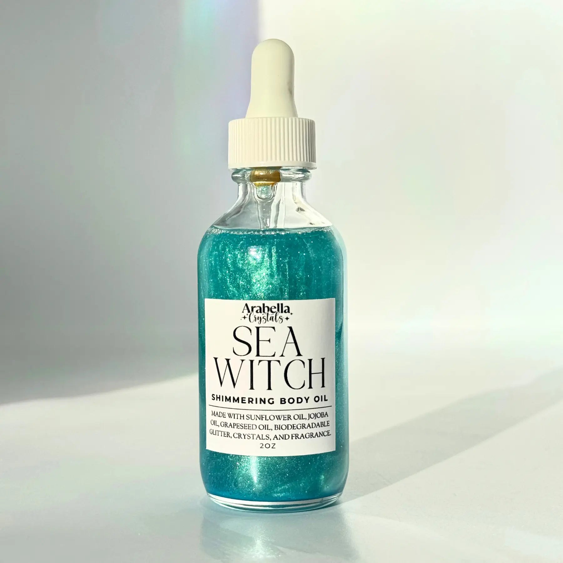 Sea Witch Shimmer Oil Notes of: Linen, Sea Salt, Powder