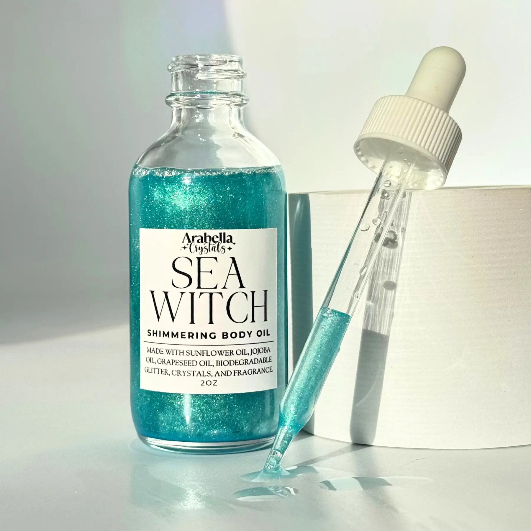 Sea Witch Shimmer Oil Notes of: Linen, Sea Salt, Powder